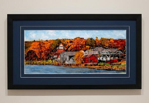 Framed print featuring original artwork of Rogers Street Fishing Village in Two Rivers Wisconsin by PK for FISHSTKS.